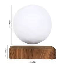 White spherical object on a wooden base with dimensions indicated